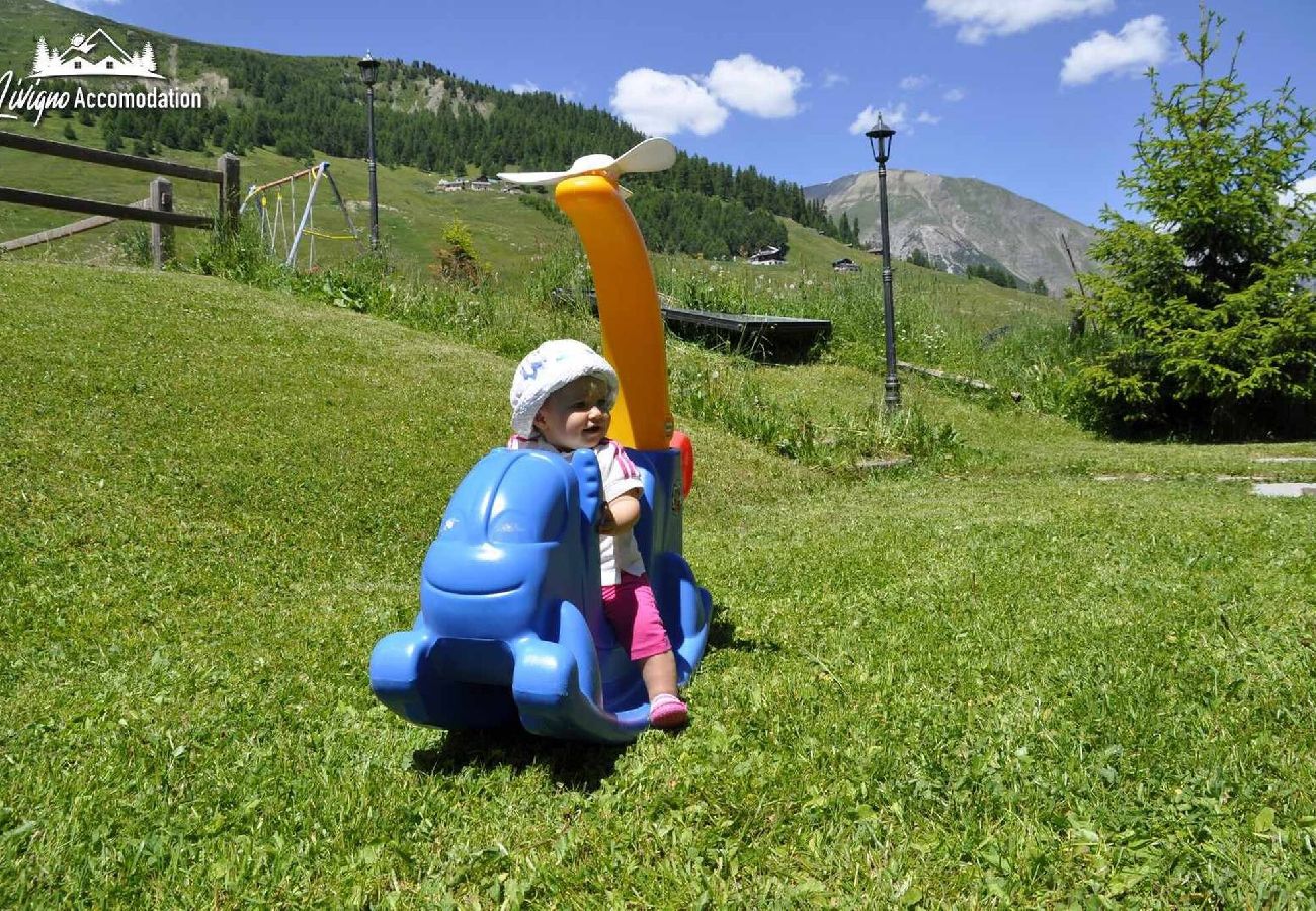 Appartamento a Livigno - Alpen Royal Savio - con giardino e raggiungibile con gli sci ai piedi 