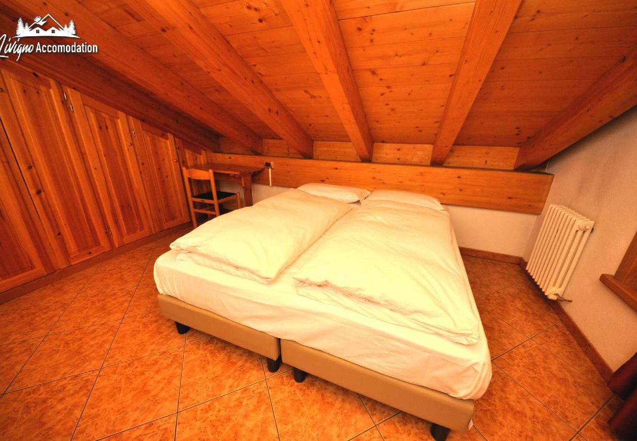 Appartamento a Livigno - Trilocale mansardato con balcone e vista sulle montagne 